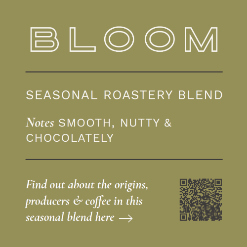 Coffee blend packaging with 'BLOOM' branding and coffee flavor description on a green background.